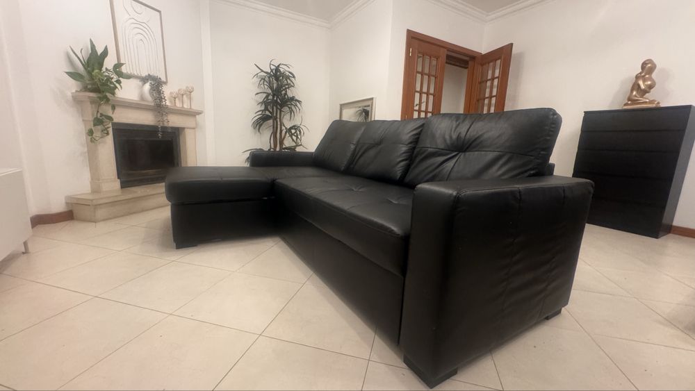 Sofa preto com cama