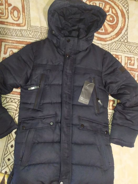 Продам новую мужскую зимнию куртку