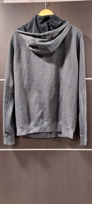 Casaco cinza In Extenso