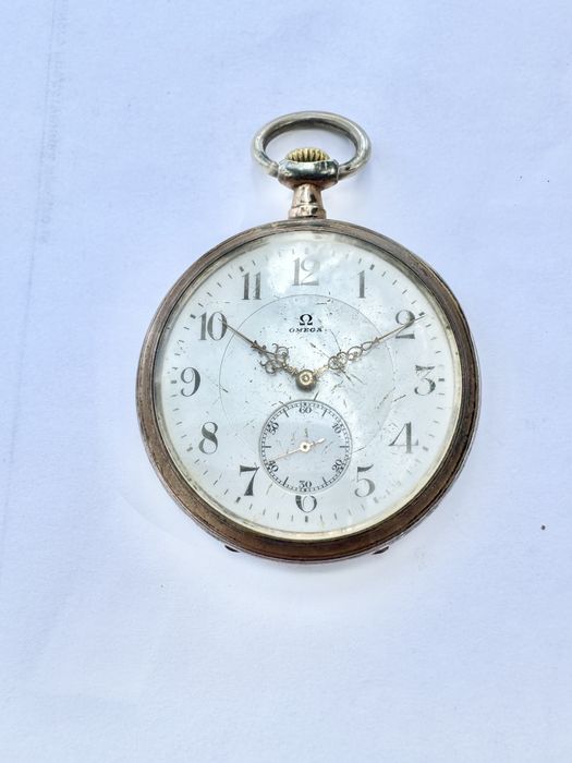 Карманные часы Омега серебро