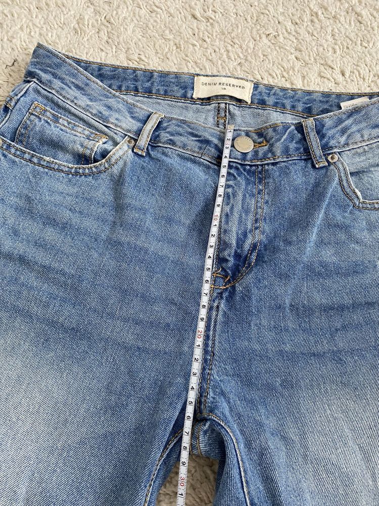 Niebieskie dżinsy jeansy boyfriend z dziurami Reserved rozmiar 38 M