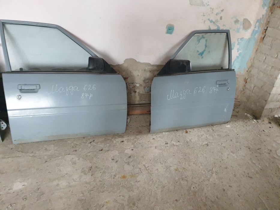 Двері мазда 626 86р седан