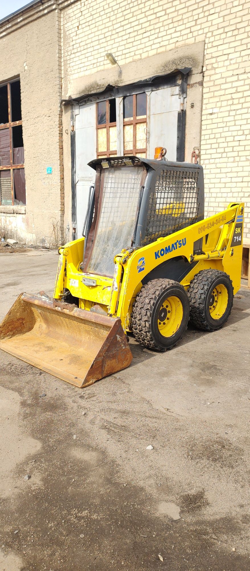 Міні навантажувач Komatsu sk714 , Бобкат.