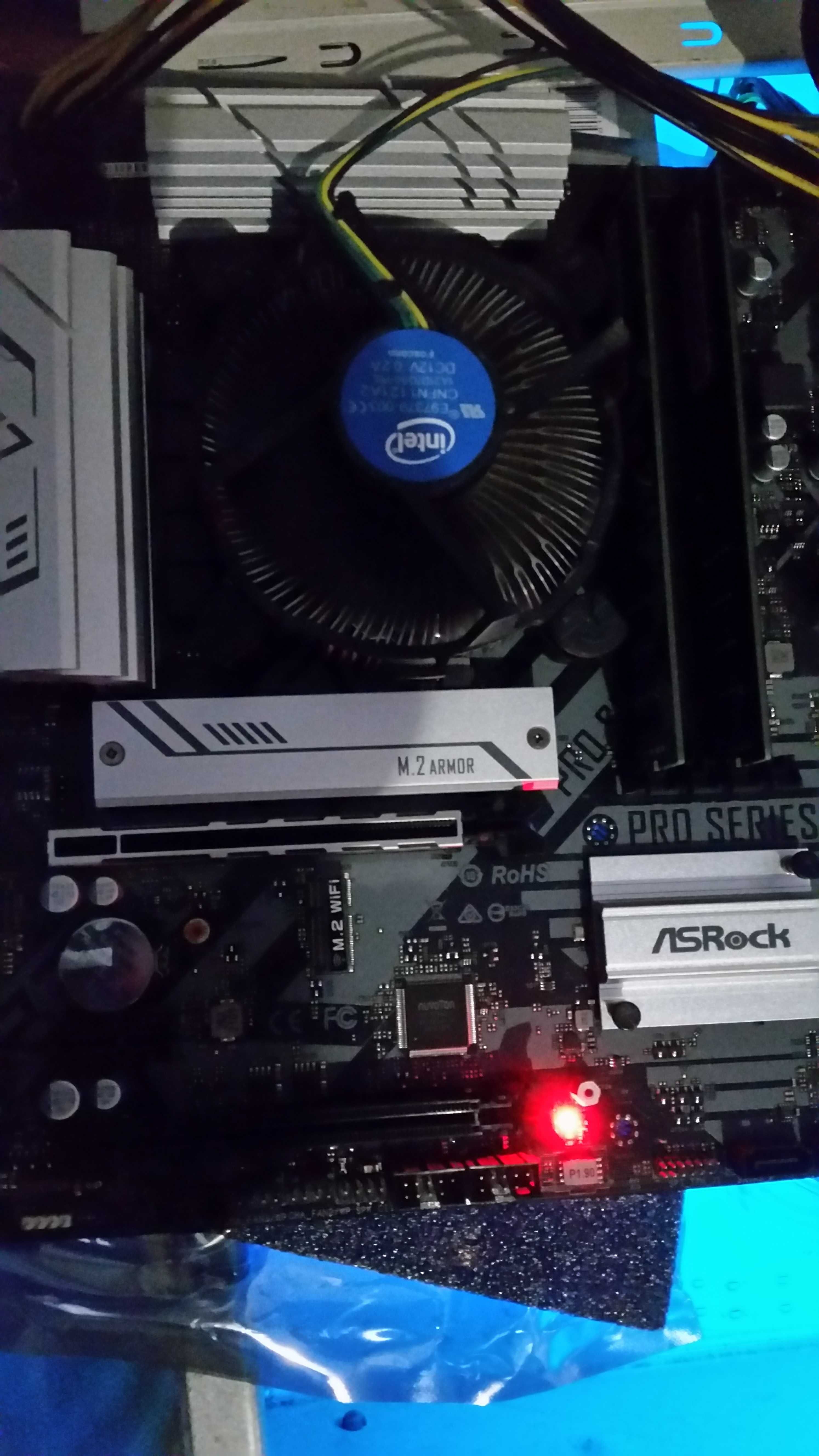Материнська плата Asrock B560m Pro4