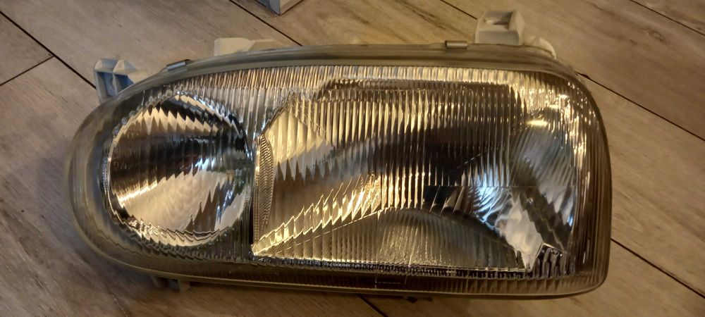 Leflektor lewy VW GOLF 3