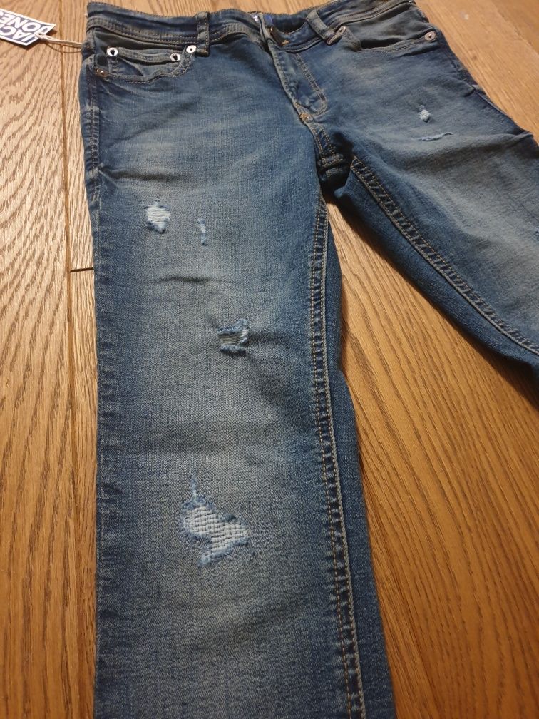 Spodnie nowe jeansy 152