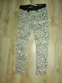 Jeansy damskie zebra