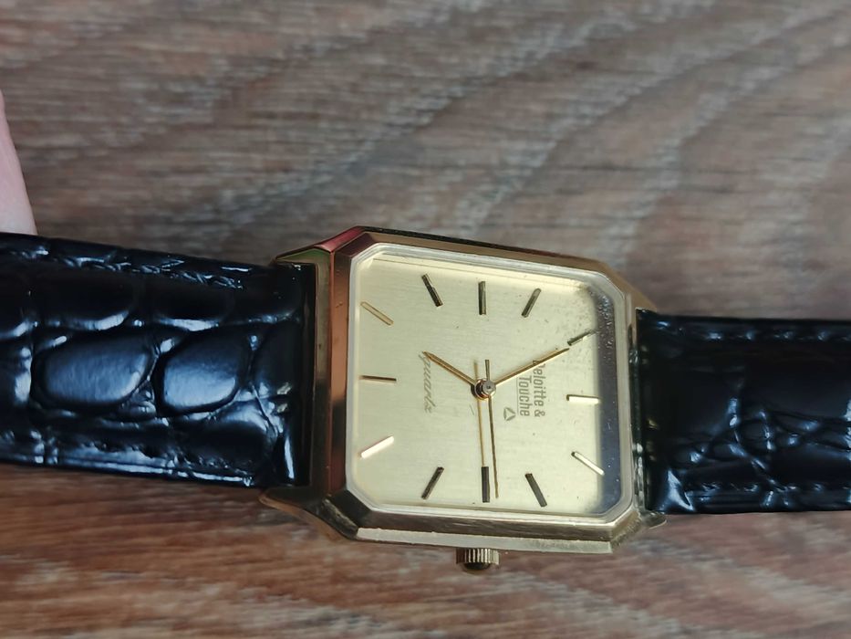 Sprzedam złocony męski zegarek garniturowy Deloitte & Touche