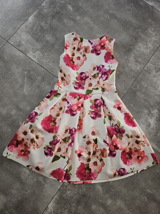 Piekna sukienka w kwiaty rozmiar 42 quiz