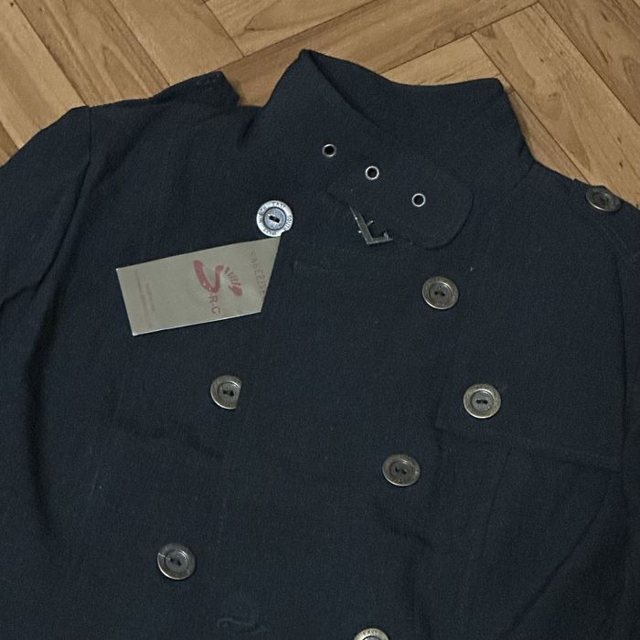 новий піджак з біркою