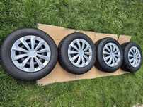 Komplet opon zimowych 195/65R15 z felgami + kołpaki