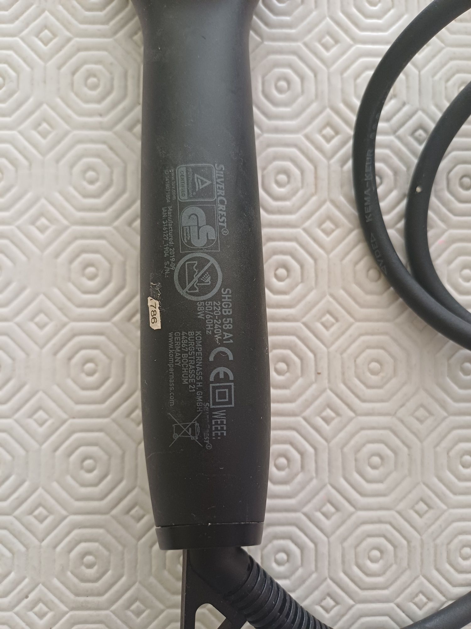 Escova de cabelo eléctrica