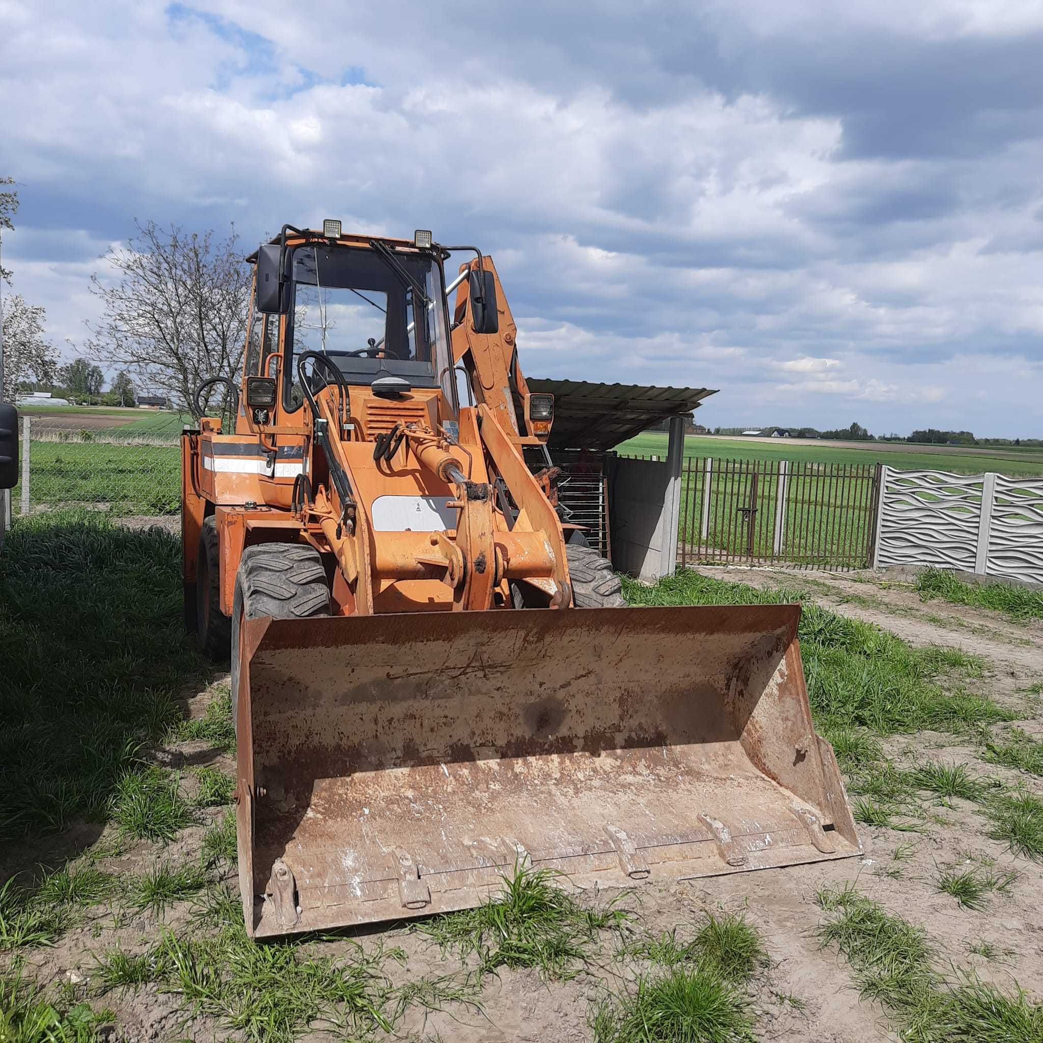 Koparko-ładowarka FAI Komatsu 595 4X4 Perkins Turbo łamaniec