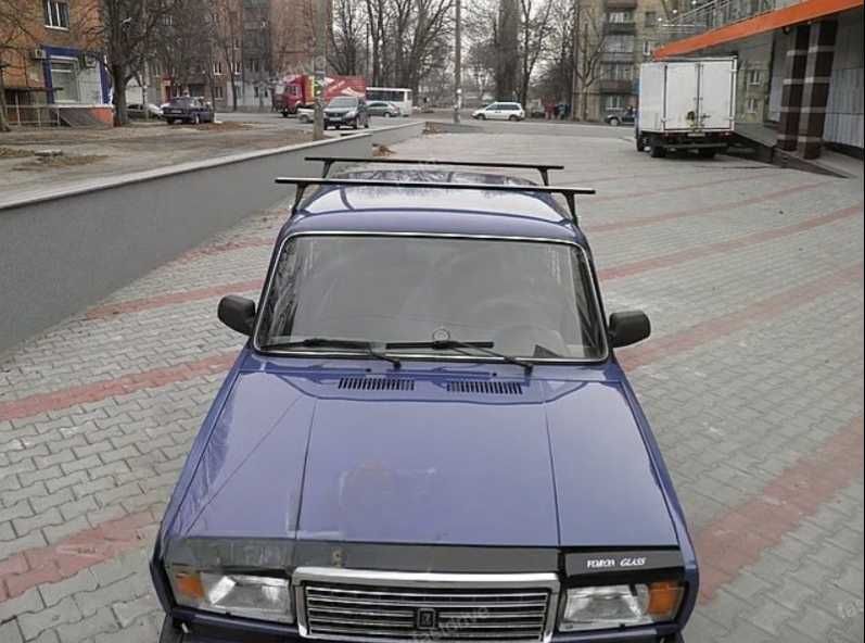 Багажник UNI для автомобілів з водостоком та зі спецкріпленням