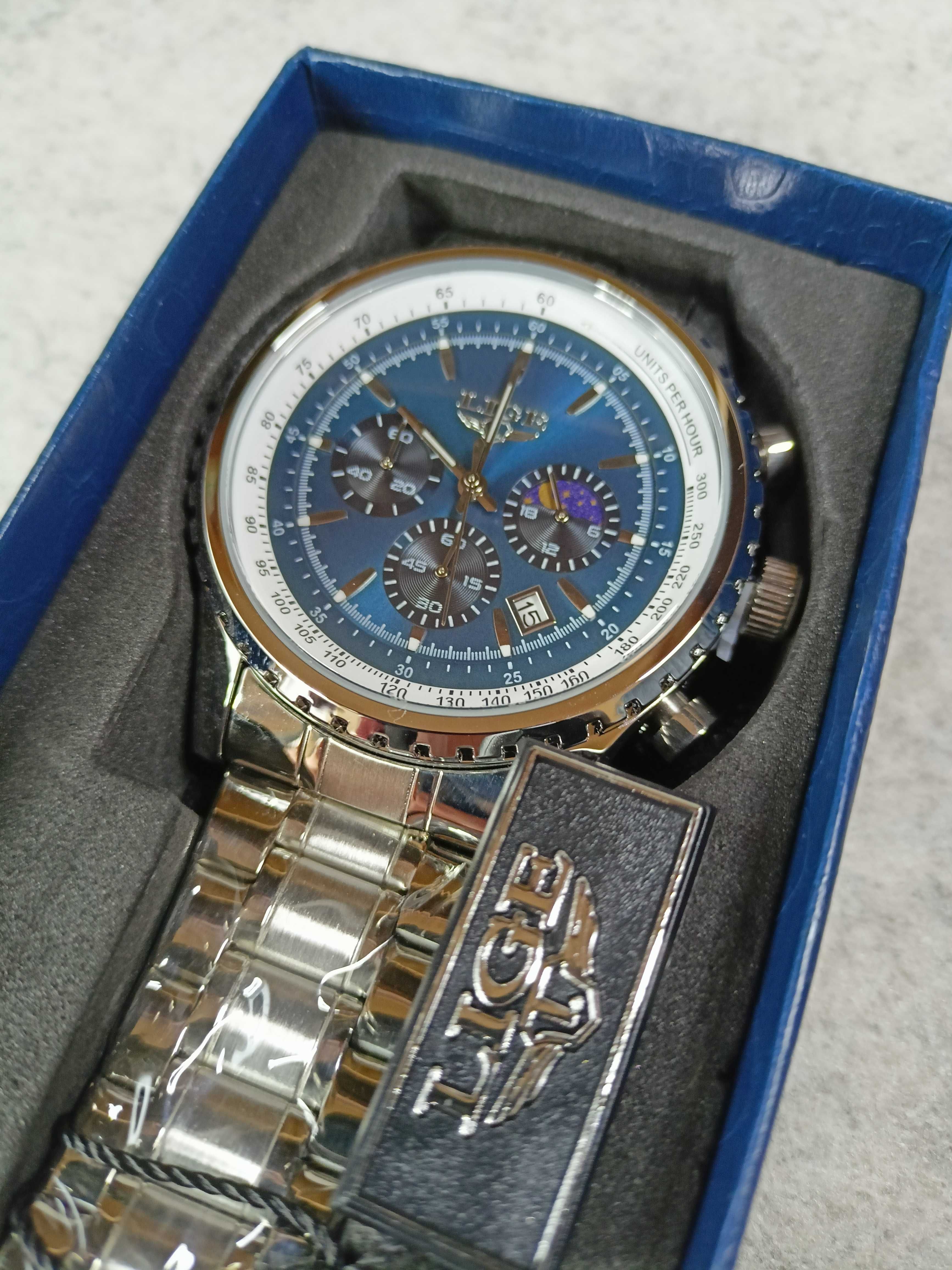Piękny elegancki dobrze wykonany zegarek męski chronograf bransoleta.