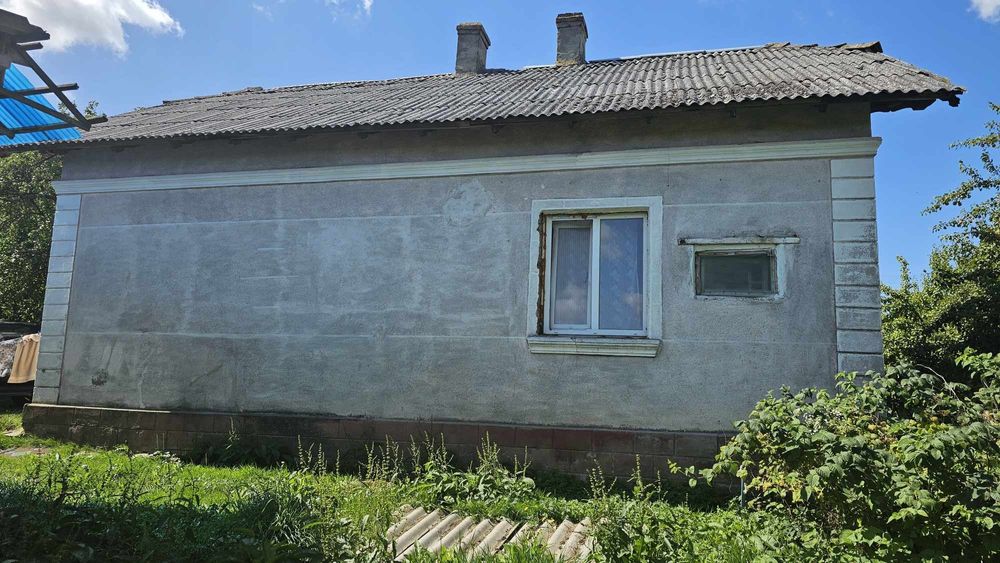 Будинок с. Підзамочок