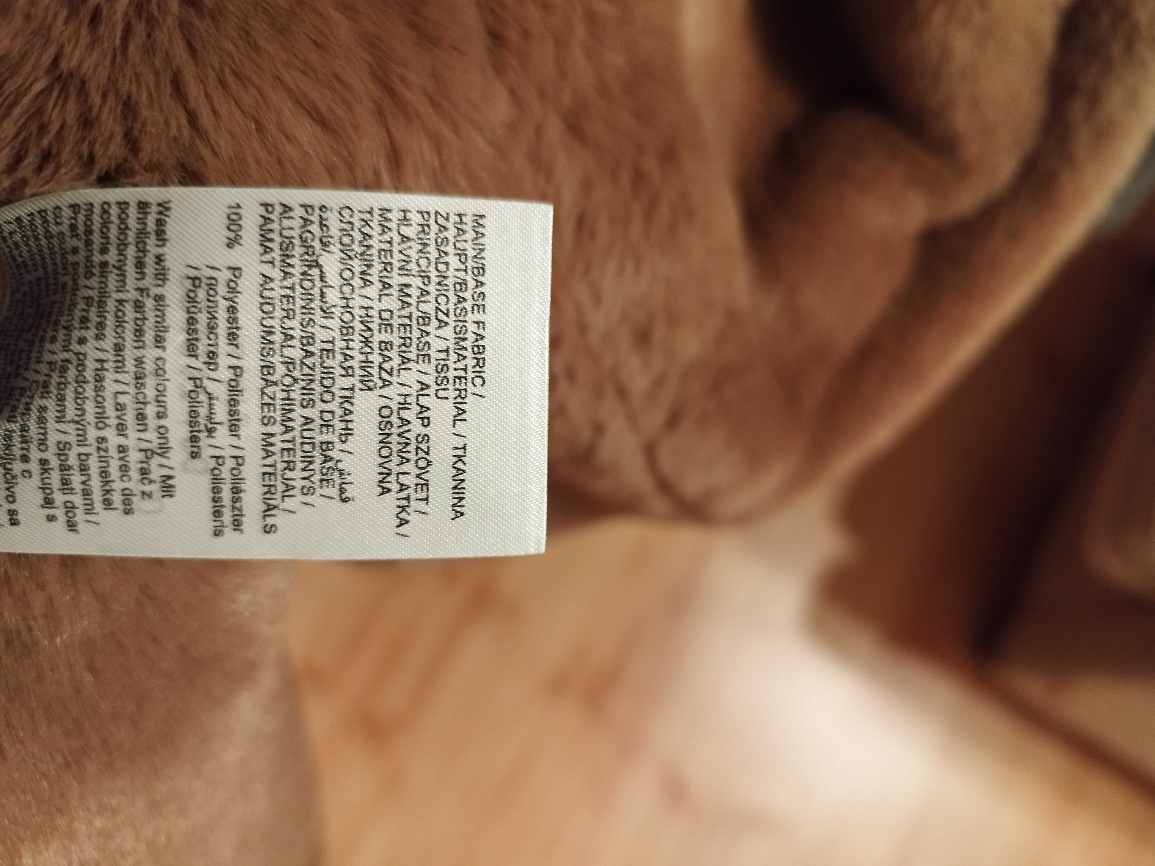 Długi ciepły kożuszek