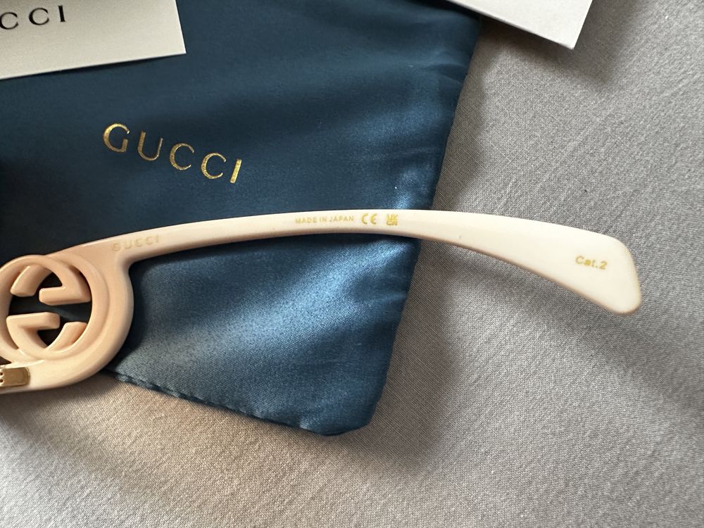 Okulary przeciwsłoneczne Gucci kremowe oprawki GG