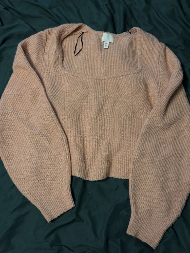 Sweter w kolorze pudrowego różu