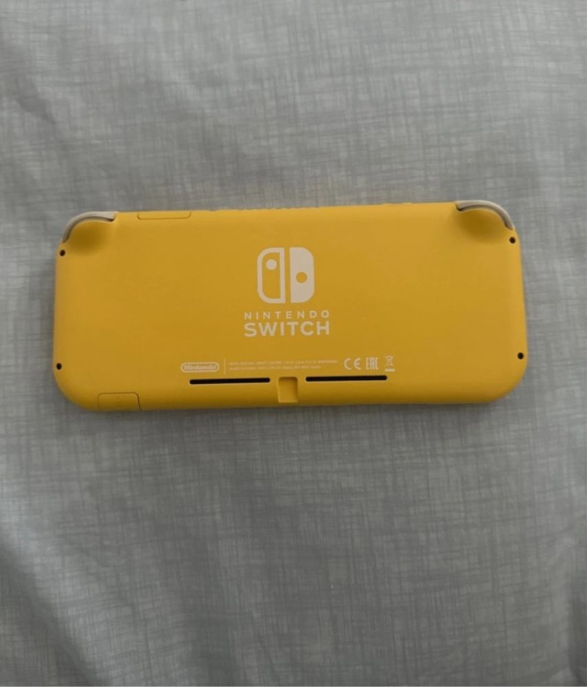 Nitendo Swtich + Jogo Super Mario Bros Deluxe