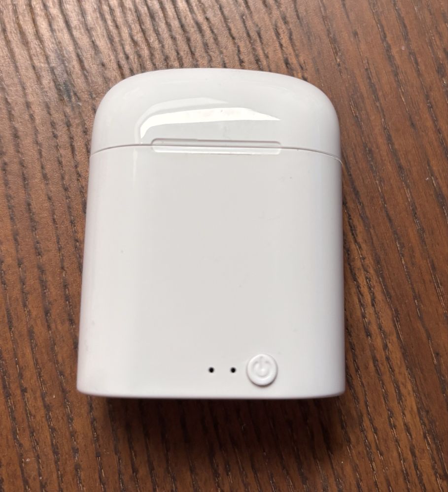 Słuchawki bezprzewodowe bluetooth białe z bazą do ładowania i kablem