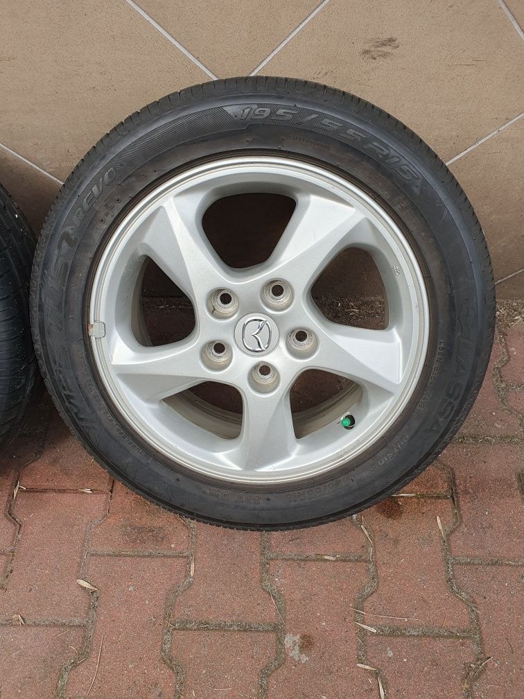 Oryginalne Felgi 15" Mazda 5x114.3 ET50+ 195.55.15 Letnie 7mm