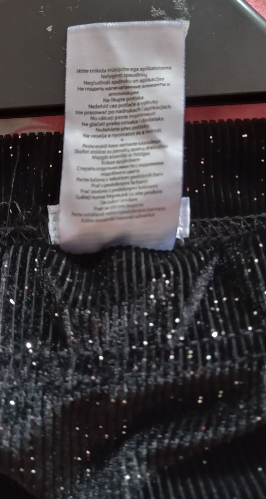 Czarne prążkowane leginsy z drobinkami srebrnego brokatu r 140cm Girls