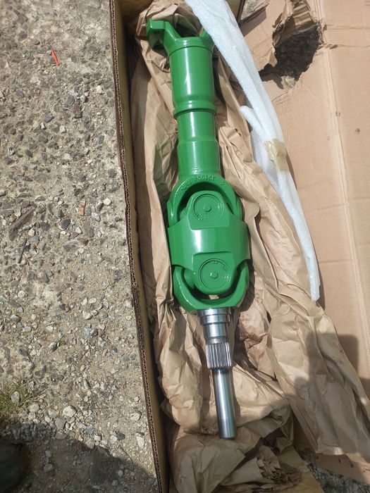 RE586742 карданний вал (піввісь) трактора John Deere (Джон Дір).