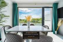 Apartamenty nad jeziorem sauna Mazury, nocleg domek mieszkania na doby
