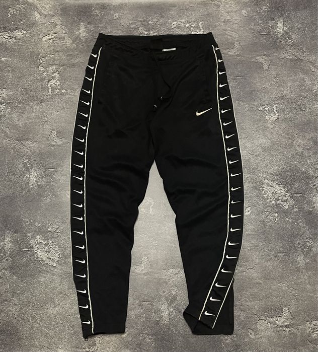 Штани nike на лампасах