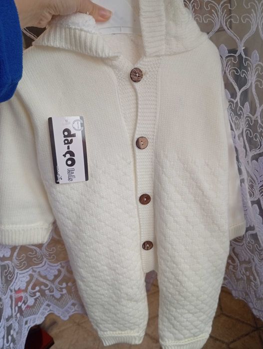 Новий комбінезон 9м