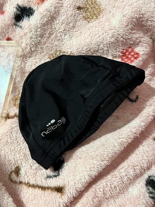 Toca de menino de natação