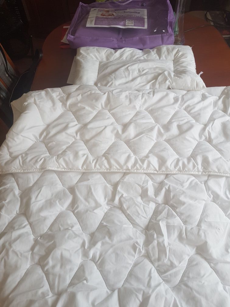 Kołderka i poduszka do łóżeczka niemowlęcego Traumeland