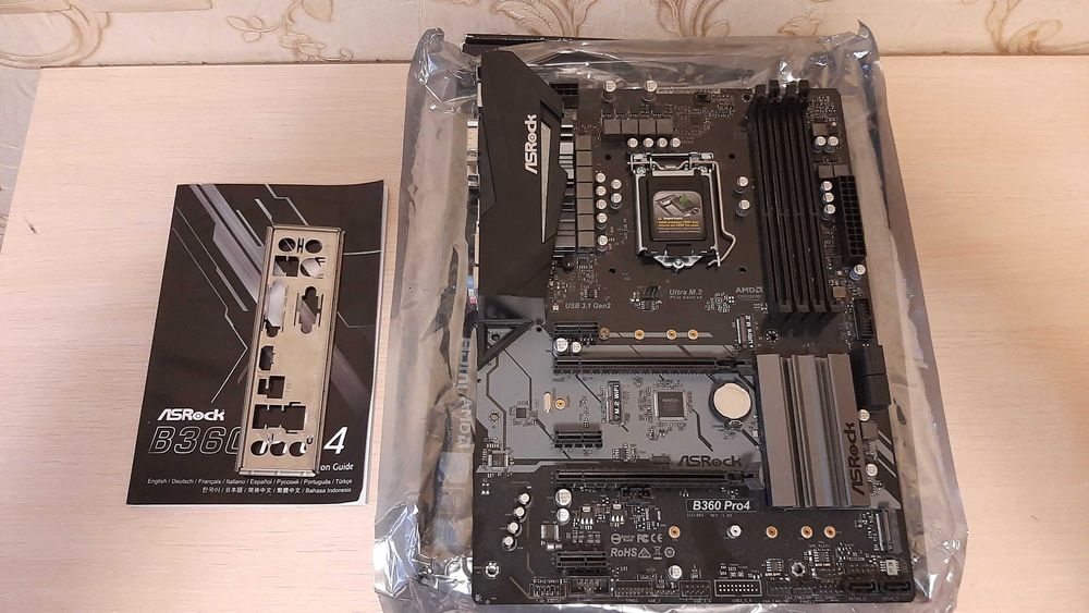 Материнська плата ASRock B360 Pro4