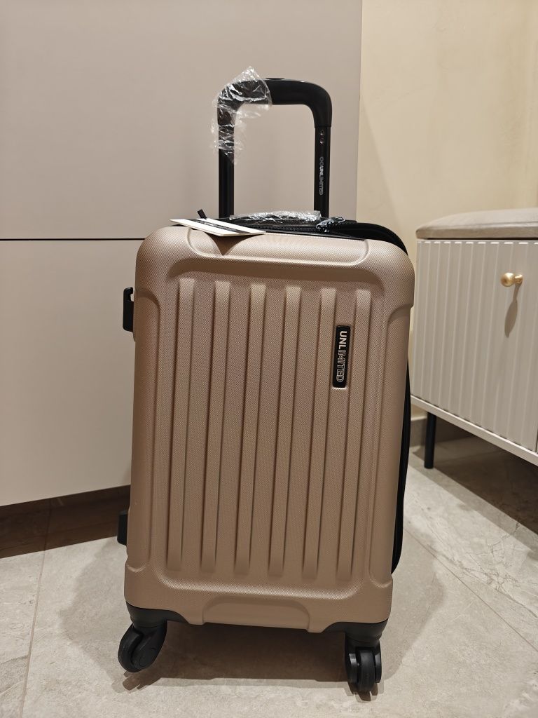 Walizka podróżna Wings Unlimited 38l nowa szampańska kabinowa