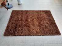 Carpetes e tapetes de fios altos