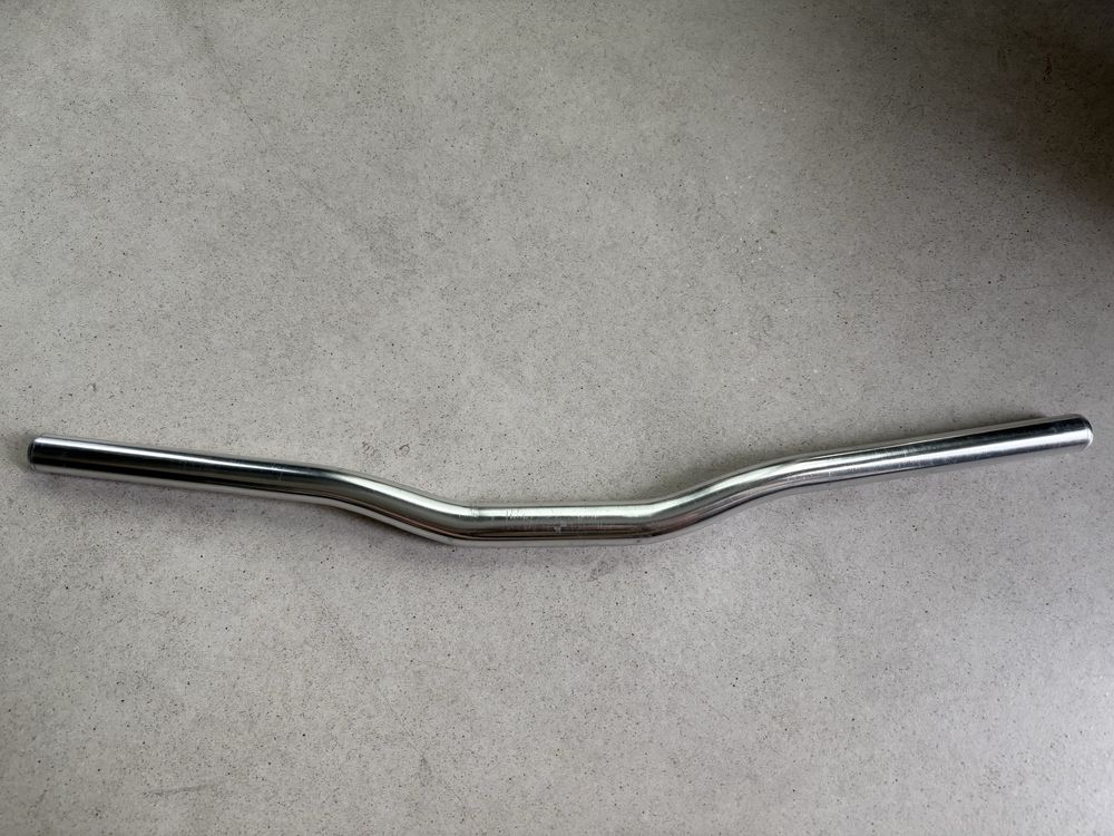 kierownica UNO gięta 25,4 srebrna gięta 590 mm fixed retro mtb