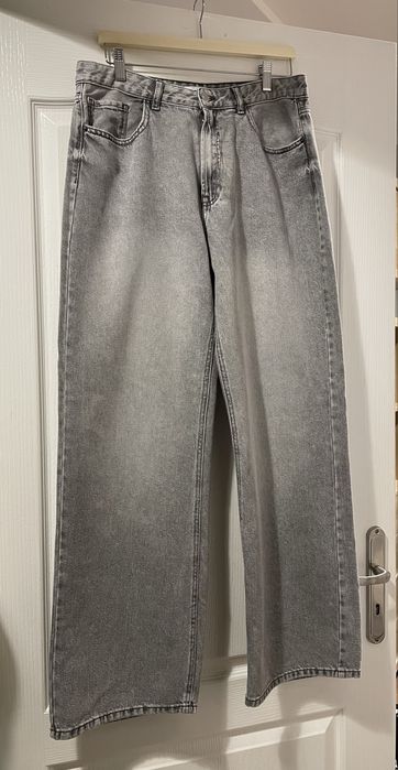 Wiralowe spodnie wide leg jeans 42 XL Sinsay