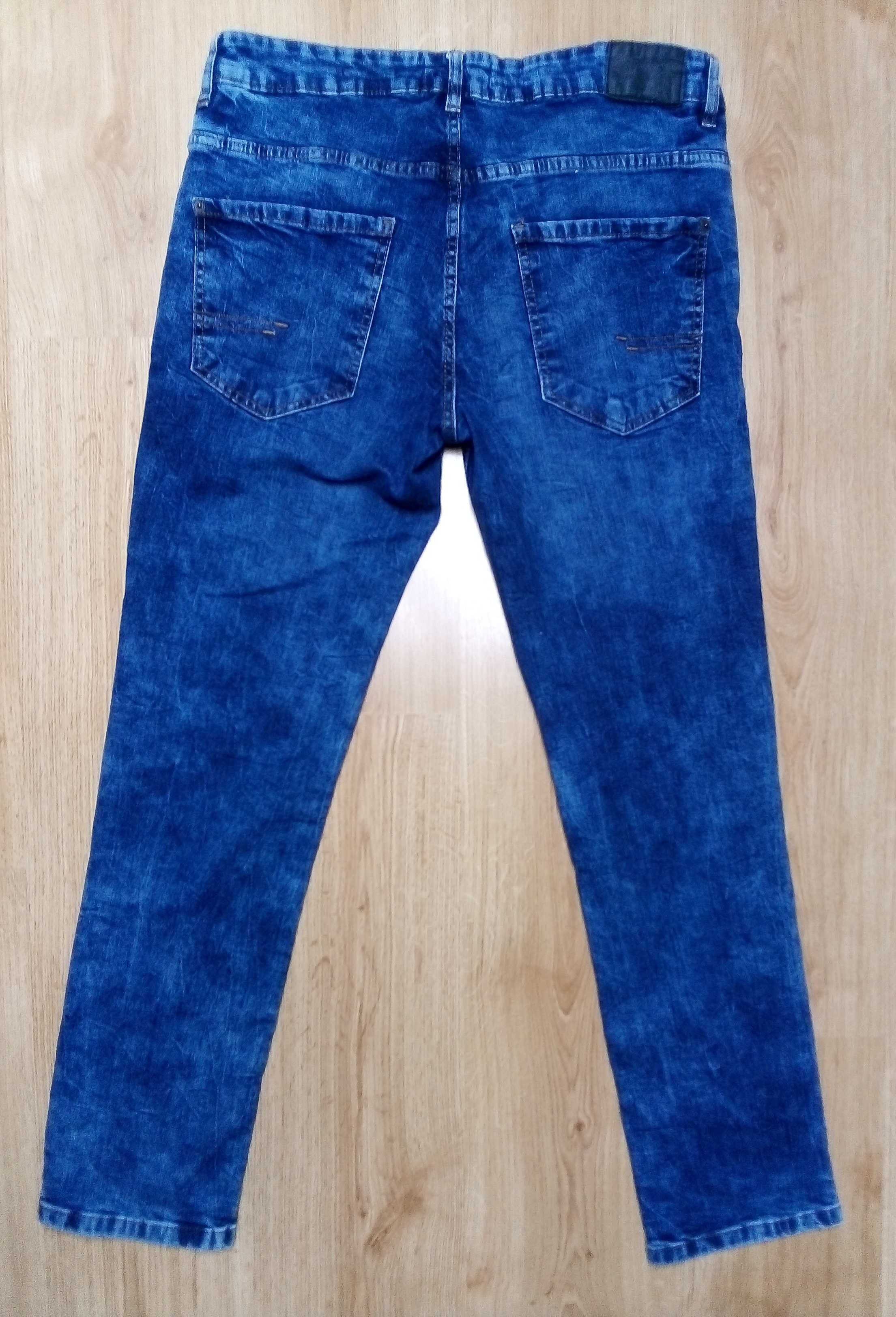 Spodnie męskie jeans Reserved r. 33