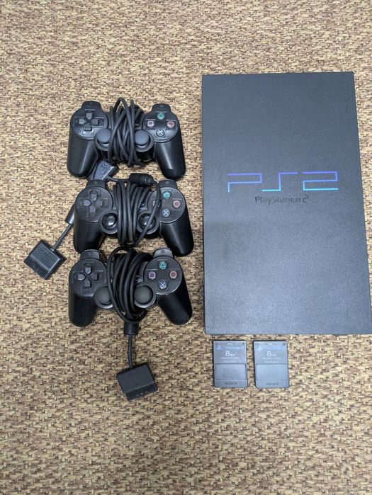 PlayStation 2 Fat SCPH-30004 + 3 comandos + 2 memory cards