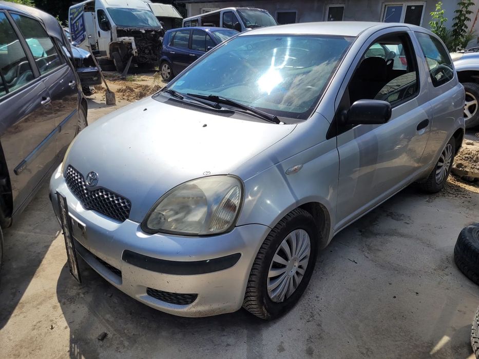 TOYOTA YARIS 1 LIFT 1E7 maska pokrywa silnika klapa bagażnika zderzak lampa reflektor pas przedni stop lampy halogeny