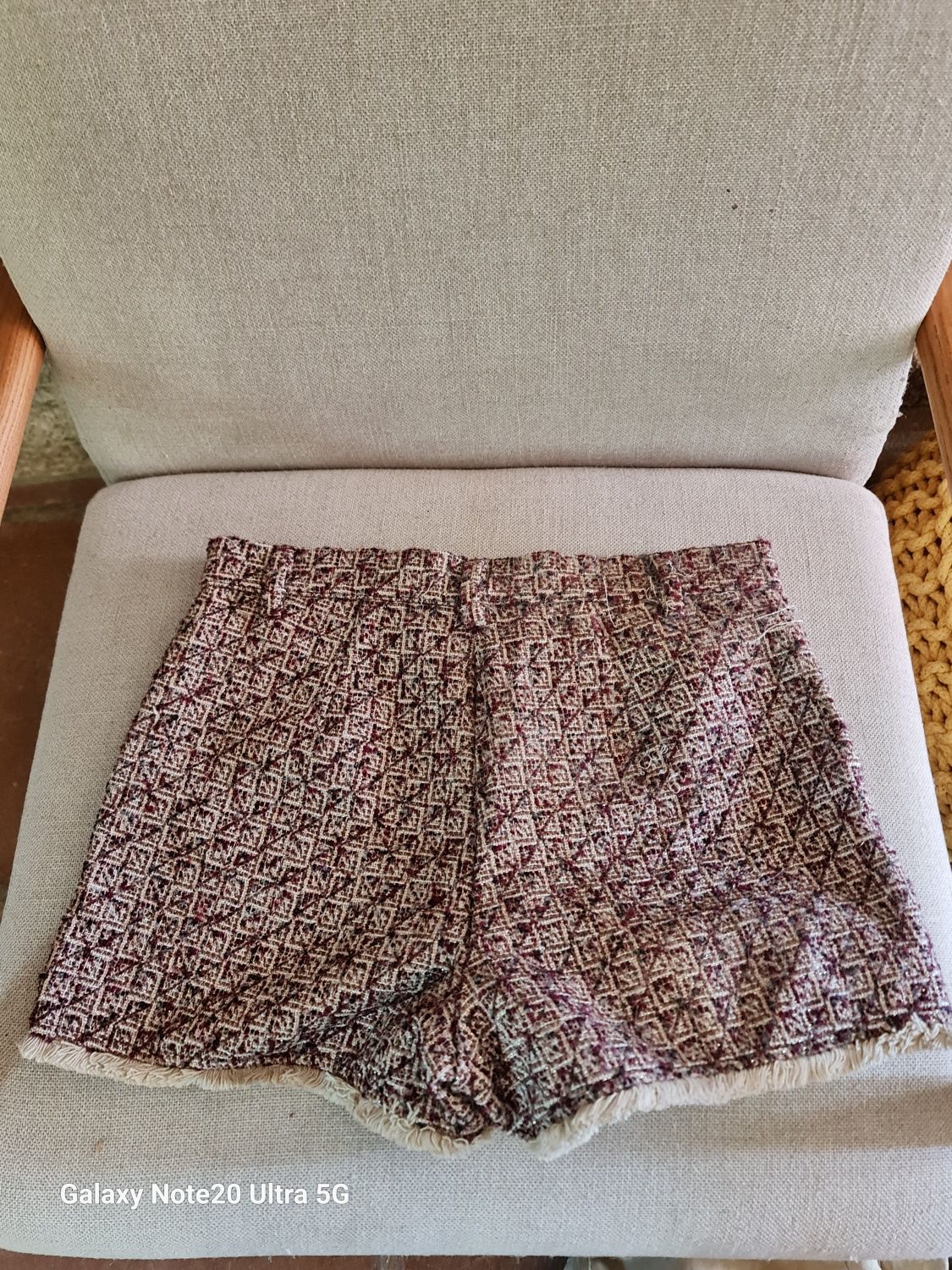 Calções com pequena franja Sisley