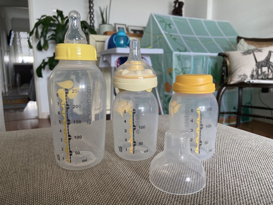 6 biberões Medela com tetinas e tampas