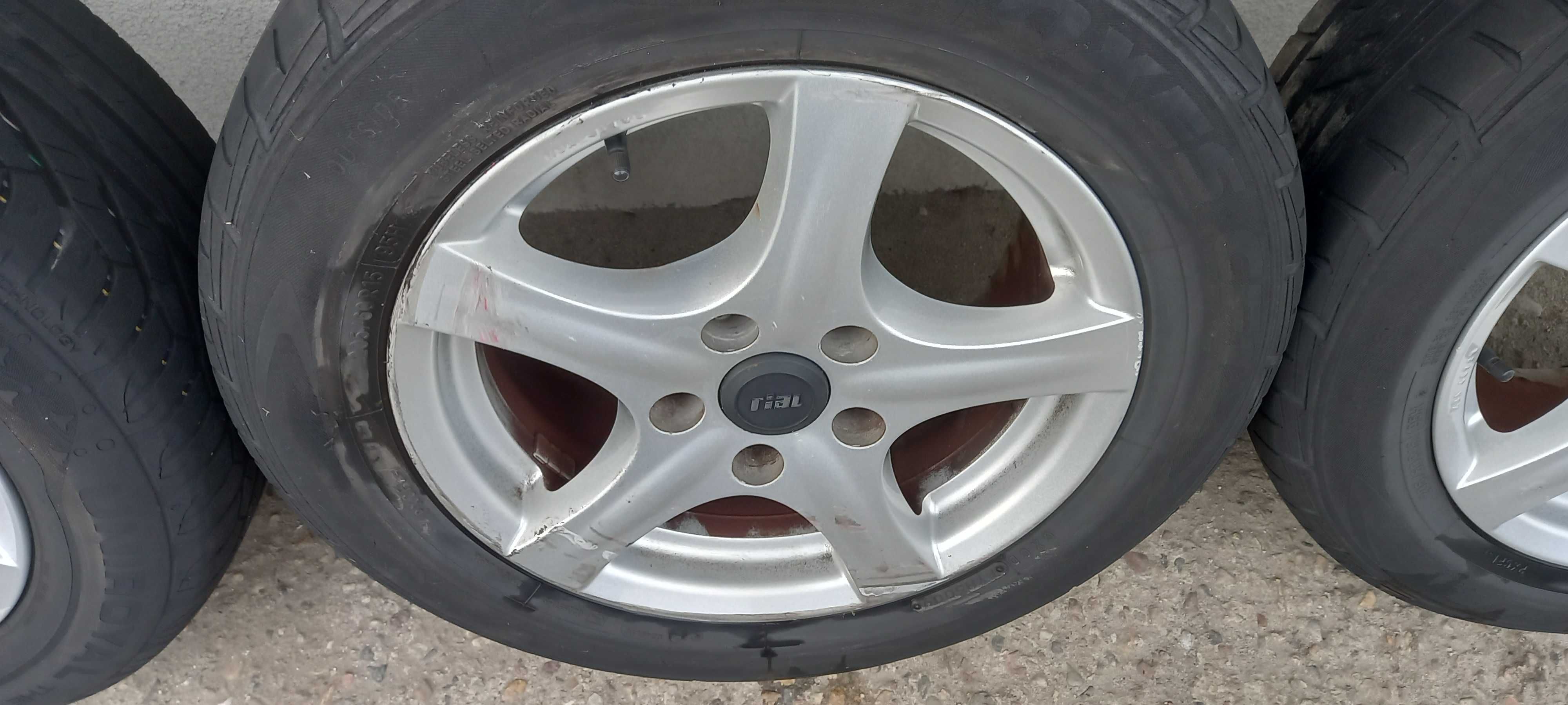 Felgi aluminiowe koła opony Audi A4 A6 VW 15" 5X112 lato kpl