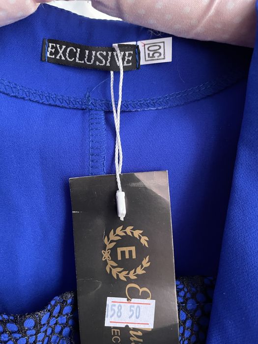 Костюм юбка и кофта с баской 50р