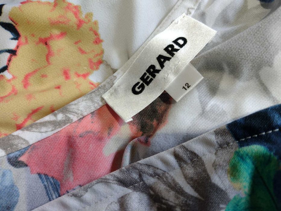 sukienka  lato letnia biała w kwiaty L kwiatki  bez rękawów elastyczna