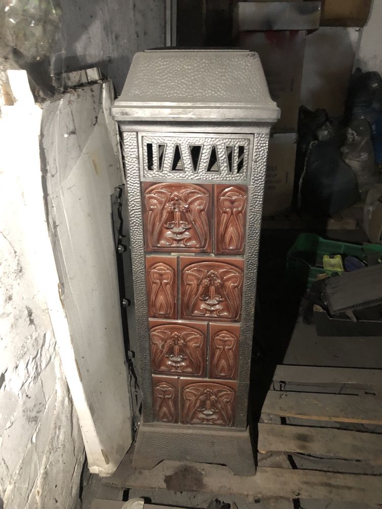 Zabytkowy piec kaflowy koza