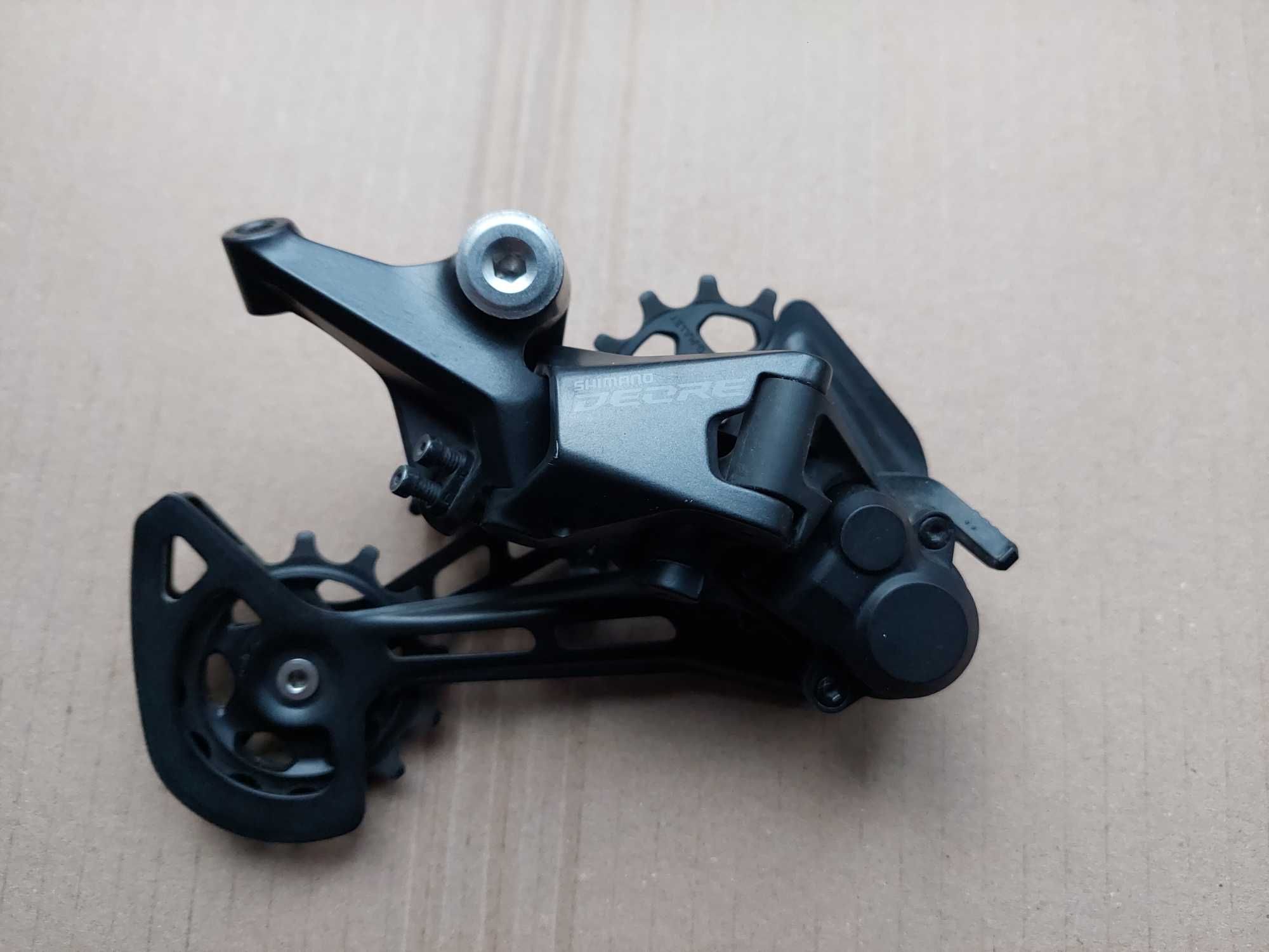 Задній перемикач Shimano Deore RD-M5100 Shadow+,перекидка,mtb.