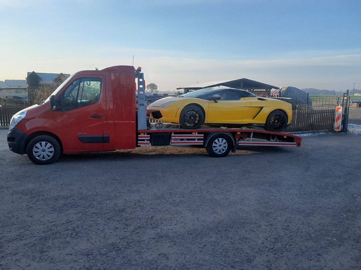 holowanie aut transport autolaweta auto laweta pomoc drogowa 24h