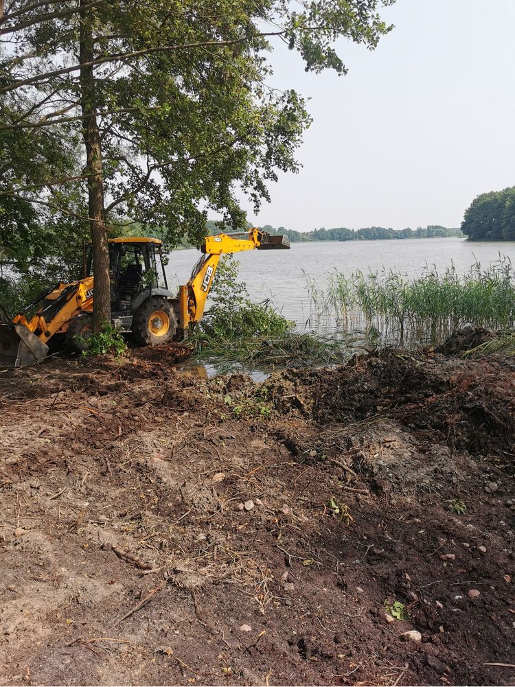 Prace ziemne Transport Wykopy koparka gąsienicowa koparko-ładowarka